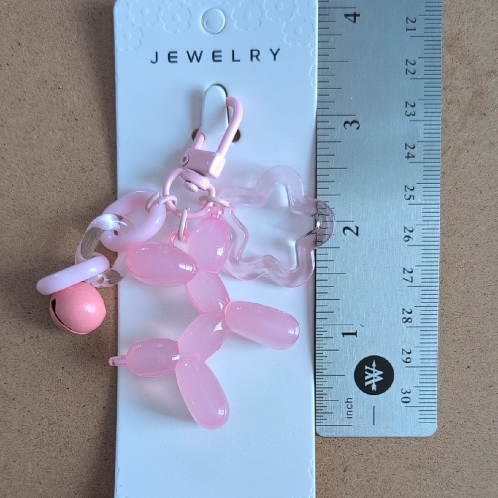 Glossy Pink Balloon Dog Keychain with Bell & Flower Link - Picture 5 of 6